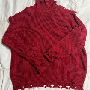 Distressed red sweater